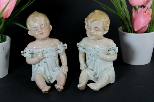 Pair german porcelain baby - pair,