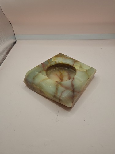 Uniquely shaped onyx ashtray - shaped,