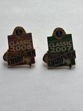Two Lions Club Metal Badges