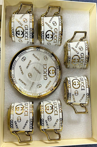 Gucci change bezel 1100l - gucci,