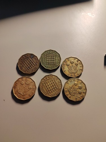 Three pence coins collection - three,