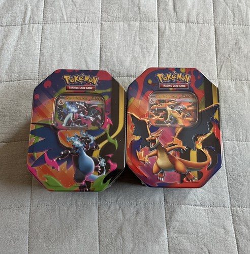 Mega charizard tins - charizard,