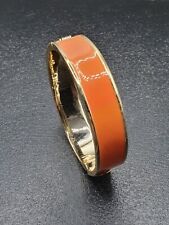 SIGNED HARRODS ORANGE ENAMEL GOLD PLATED BANGLE