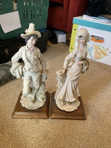 Boy and girl figurines - boy,