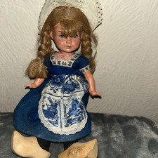 Hard Plastic Dutch Doll Wearing Wooden Clogs.