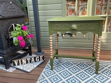 vintage solid wood carved table arts and crafts with drawer dark green and gold