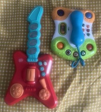 Chad Valley Rockstar Guitar and Chicco Magic Phone Toy