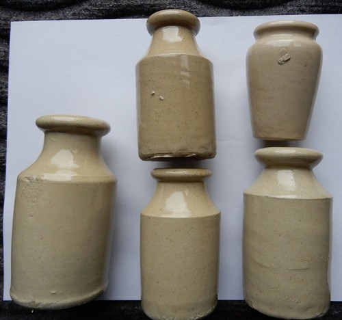 Five off white stoneware cream