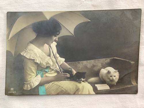 Lady under parasol with two