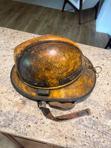 Used yellow fire helmet - ,, sold