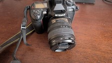 Working Nikon D100  with 8gb memory and 2 batteries and manual