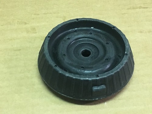 Rear suspension strut top - rear,