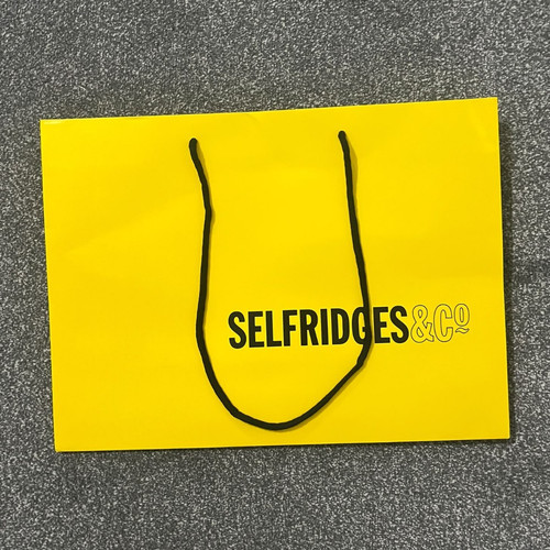 Selfridges yellow paper - selfridges, &