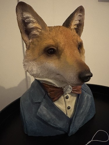 Small fox bust smartly - bust.,