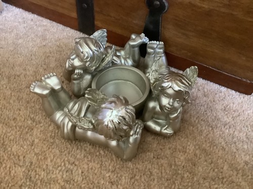 Silver colour cherub tea light
