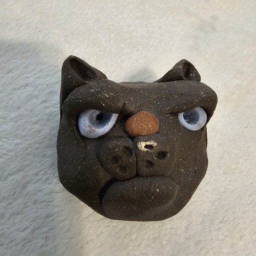 Clay cat head grouchy - cat,