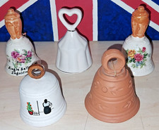 5 assorted size decorative collectable bells.