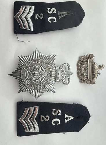 Old police badges and straps - old,