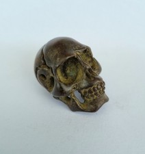 Small but characterful vintage bronze human skull, can be used as a pendant.