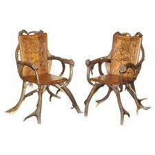 PAIR OF ANTIQUE GERMAN BLACK FOREST CARVED ANTLER ARMCHAIRS PART OF A SUITE
