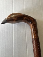 A Walking Stick With A Carved Partridge Head  On A Hazel Shank Ferrule Fitted