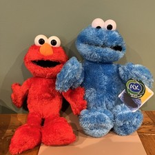Sesame Street Tickle Me Elmo 2011 Edition and Cookie Monster 