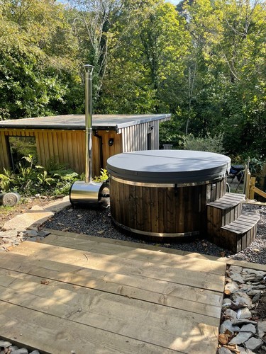 Wood fired hot - tub, grade