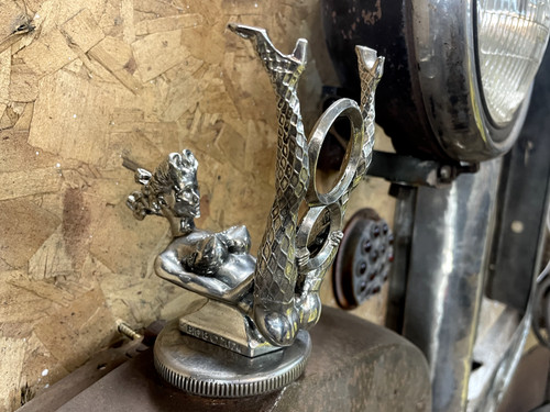 V8girl pin hood ornament - up,