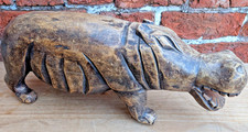 Hand carved wooden hippo - hand,