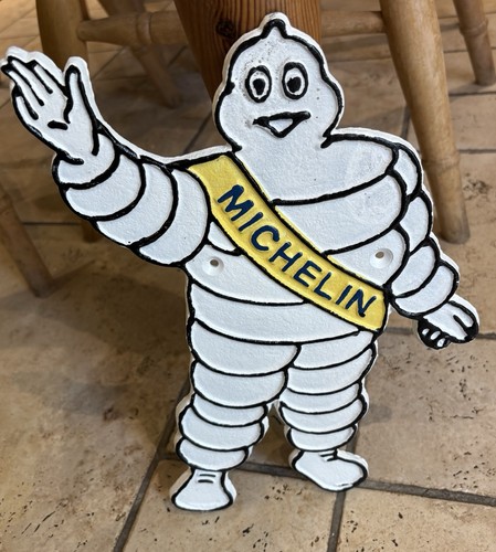 Michelin man cast iron wall - man,