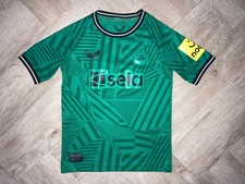 NEWCASTLE UNITED CASTORE AWAY FOOTBALL SHIRT 2023/24 - SMALL CHILD 4-5 YRS 110CM