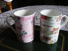 Two Cath Kidston 4" Tall Mugs  Houses Pattern and Good Luck Design.