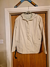 Astraka Ladies Rain Coat  with