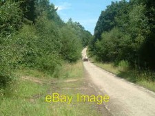 Photo 6x4 Farmer on his Four