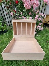 Rabbit hay feeder with sandbox