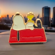 Snoopy Laying On His Doghouse