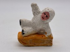 Antique Snow Baby On Sled