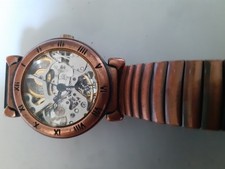 bronze eton skeleton watch .working
