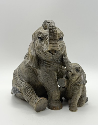 Dog studies elephant calf - dog,