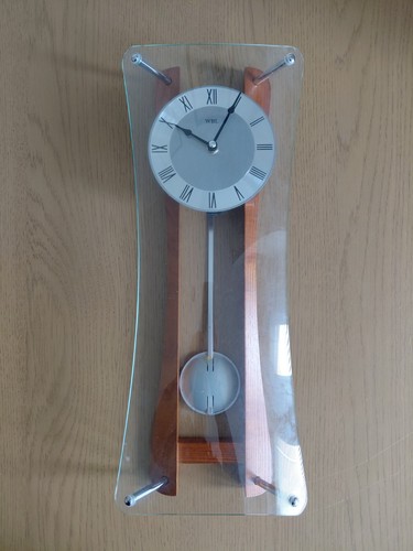 Wall clock with pendulum - wall,