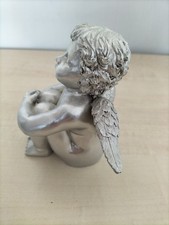 Small silver colour cherub