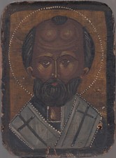 Antique painted Russian icon on a wooden panel