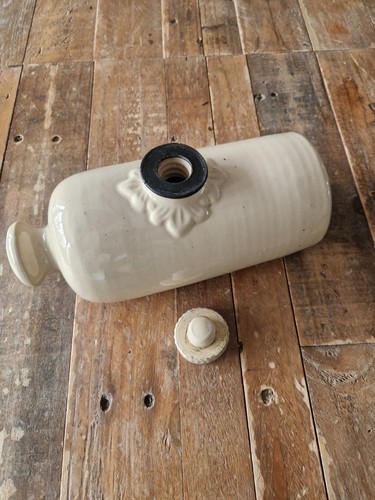 Antique cream stoneware bed