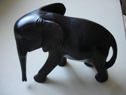 Carved wooden african elephant - carved,