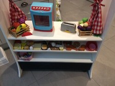 wooden kitchen toys with curtains and fruit & veg toys