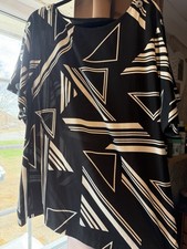 Next Size 20 Black And White