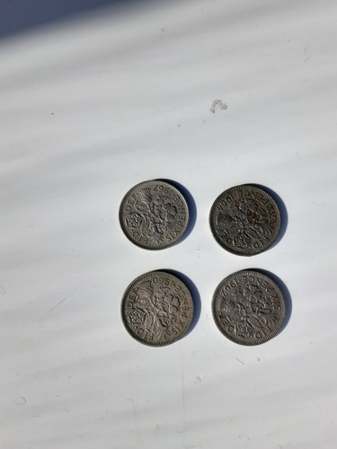Four sixpence pieces - , 1960