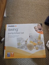 Medela Swing Breast Pump set with milk freezer bags