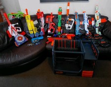 Nerf Gun and Accessory Bundle X17 Guns X2 Vests X3 Glasses X1 Rack X2 Aim Games