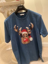Christmas T Shirt with sequin reindeer application Immaculate condition.